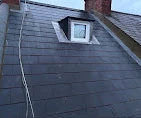 New slate roof around a roof window